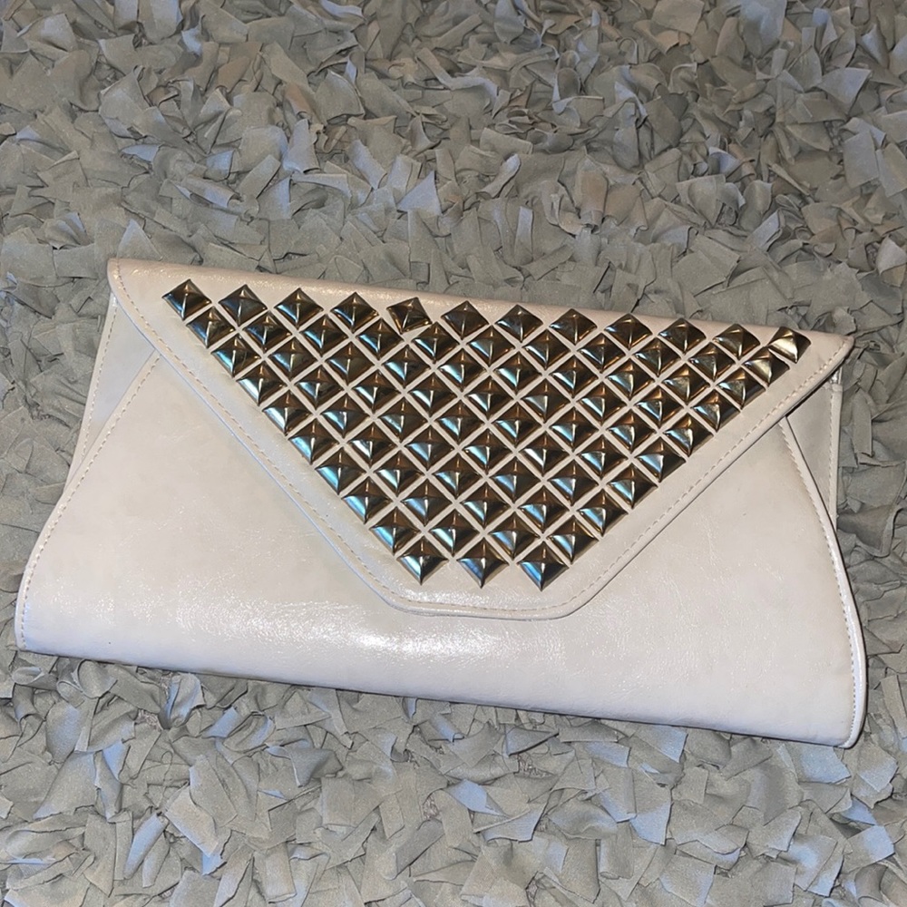 Gold studded clutch